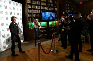 Willem Dafoe with his Gotham Tribute  in the GreenSlate Greenroom during the 28th Annual Gotham Awards at Cipriani, Wall Street on November 26, 2018 in New York City.